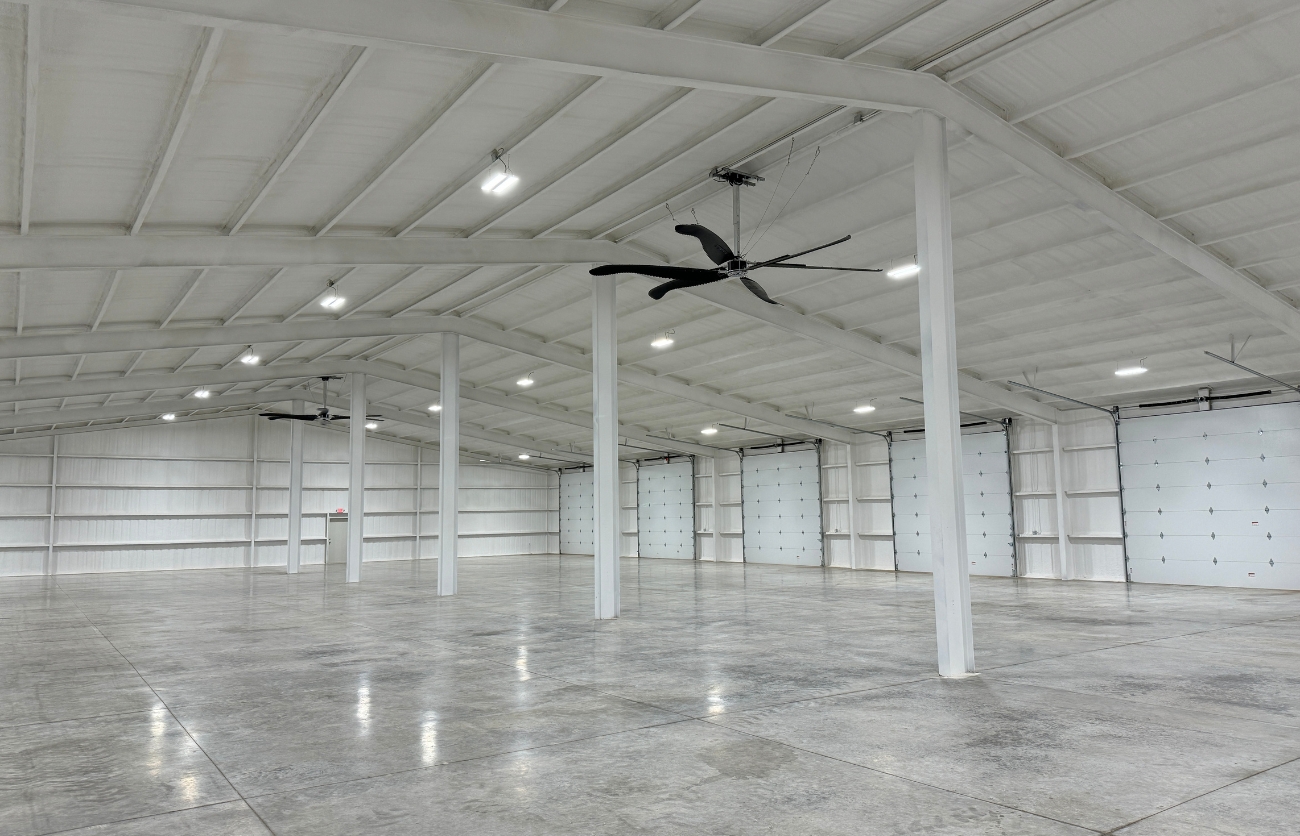 Spacious warehouse interior with high ceilings and durable construction.