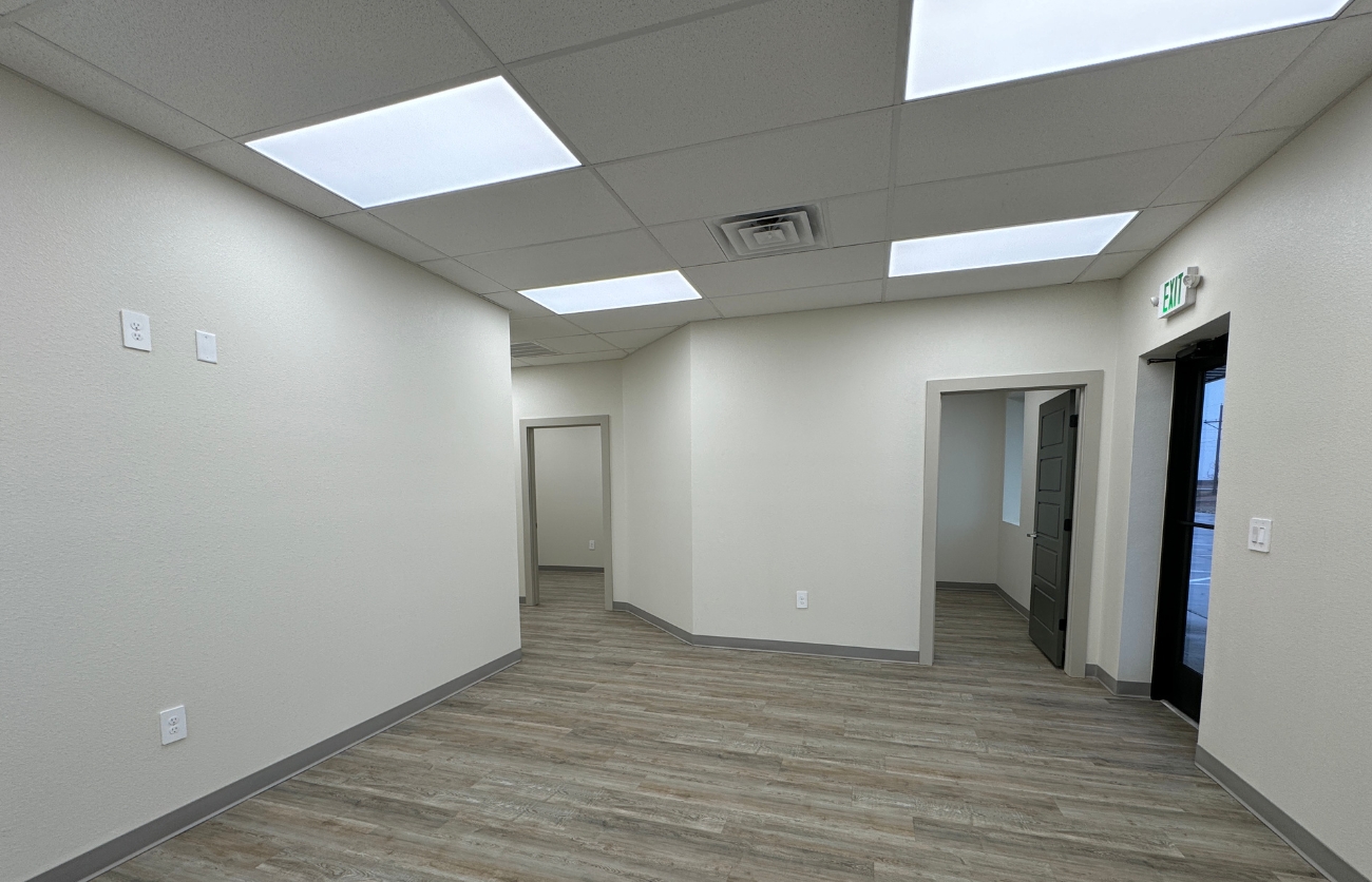 Custom industrial workspace inside metal warehouse built by Citadel Construction.